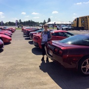 Chamberlain's parked their red  Corvette in special red parking lot at Bloomington Gold 2019.jpg