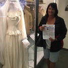 Linda next to WWII Parachute Wedding Dress.jpg