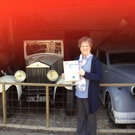 Susan Chamberlain displaying Vette  Visions with some of Kentwell's vintage automobiles.jpg